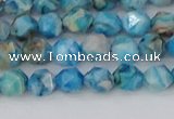 CAG9957 15.5 inches 6mm faceted nuggets blue crazy lace agate beads