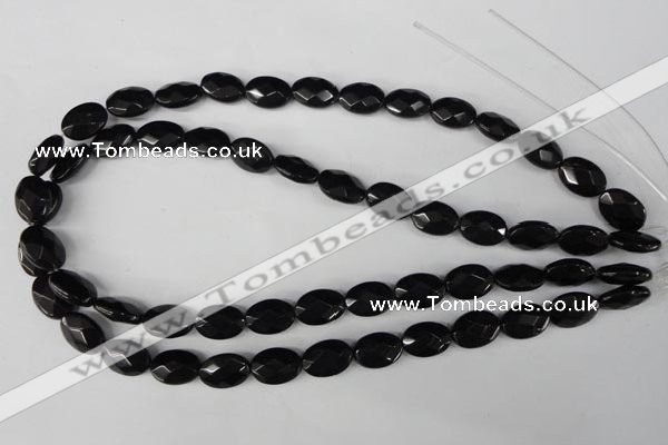 CBS310 15.5 inches 10*14mm faceted oval blackstone beads wholesale