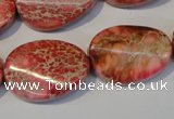 CDI575 15.5 inches 18*25mm twisted oval dyed imperial jasper beads