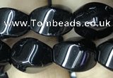 CAA2485 15.5 inches 8*12mm twisted rice black agate beads