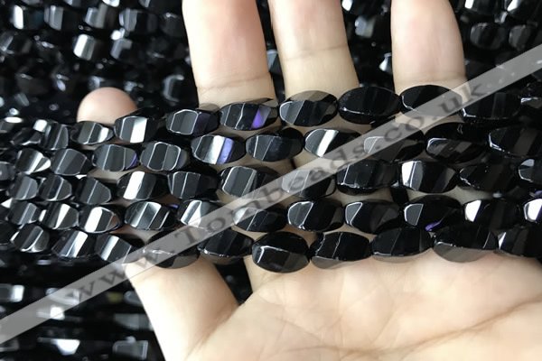 CAA2490 15.5 inches 6*12mm faceted & twisted rice black agate beads