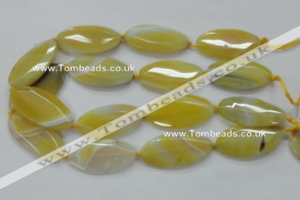 CAA325 15.5 inches 25*50mm faceted marquise yellow line agate beads