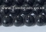 CAA3660 15.5 inches 6mm round matte & carved black agate beads