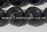 CAA3678 15.5 inches 12mm round matte & carved black agate beads