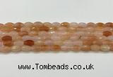 CAA5464 15.5 inches 8*12mm faceted rice agate beads