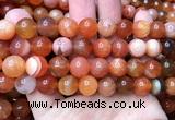 CAA6154 15 inches 12mm round orange Botswana agate beads