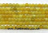 CAA6276 15 inches 4mm round yellow fire agate beads