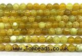 CAA6278 15 inches 8mm round yellow fire agate beads