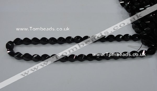 CAB335 15.5 inches 8*12mm faceted & twisted rice black agate beads