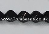 CAB336 15.5 inches 10*14mm faceted & twisted rice black agate beads