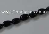 CAB744 15.5 inches 6*8mm flat teardrop black agate gemstone beads