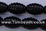 CAG1693 15.5 inches 15*20mm carved rice black agate beads