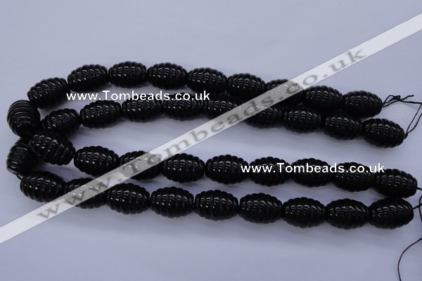 CAG1693 15.5 inches 15*20mm carved rice black agate beads