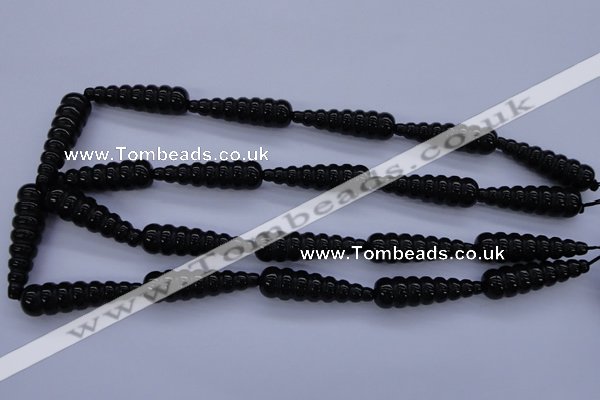 CAG1697 15.5 inches 10*35mm carved teardrop black agate beads