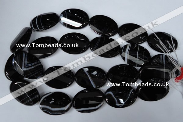 CAG3087 15.5 inches 25*35mm faceted oval black line agate beads