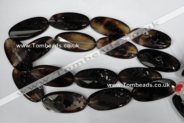 CAG3091 15.5 inches 25*50mm faceted oval black line agate beads