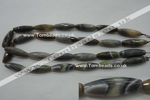 CAG3958 15.5 inches 10*30mm faceted rice grey botswana agate beads