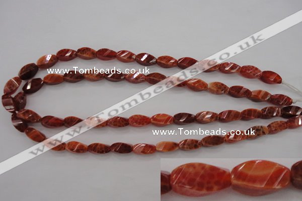 CAG4181 15.5 inches 7*14mm faceted & twisted rice natural fire agate beads