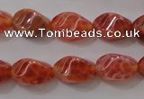 CAG4184 15.5 inches 6*10mm twisted rice natural fire agate beads