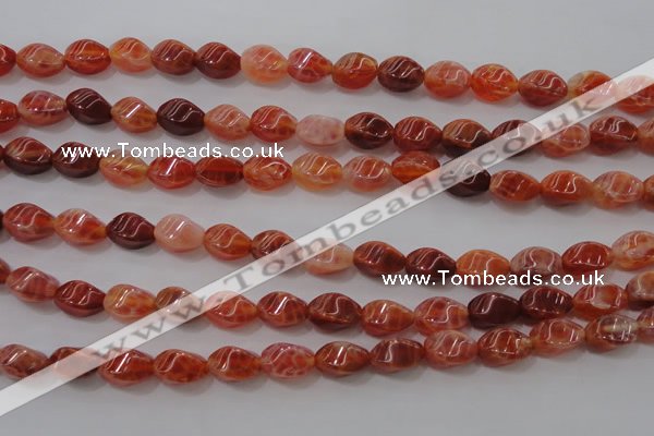 CAG4184 15.5 inches 6*10mm twisted rice natural fire agate beads