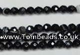 CAG5271 15.5 inches 4mm faceted round black line agate beads