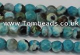 CAG5659 15 inches 4mm faceted round fire crackle agate beads