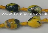 CAG5774 15 inches 10*14mm faceted rice fire crackle agate beads