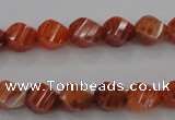 CAG580 15.5 inches 8*10mm faceted & twisted rice natural fire agate beads