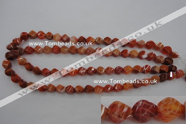 CAG580 15.5 inches 8*10mm faceted & twisted rice natural fire agate beads