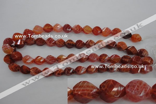 CAG582 15.5 inches 10*14mm faceted & twisted rice natural fire agate beads