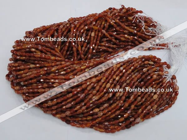 CAG597 15.5 inches 4*6mm faceted rice natural fire agate beads