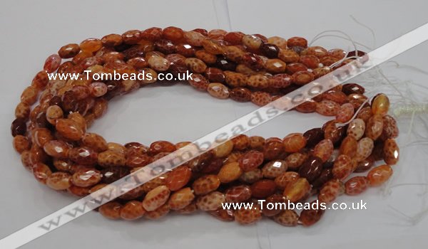 CAG599 15.5 inches 10*14mm faceted rice natural fire agate beads