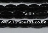 CAG6029 15.5 inches 6*10mm faceted rice matte black agate beads