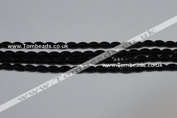 CAG6029 15.5 inches 6*10mm faceted rice matte black agate beads