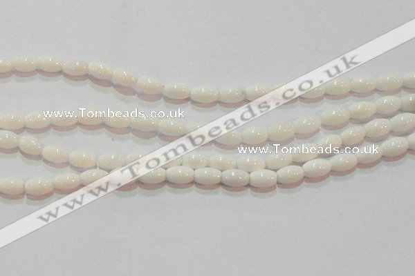 CAG7201 15.5 inches 6*9mm rice white agate gemstone beads