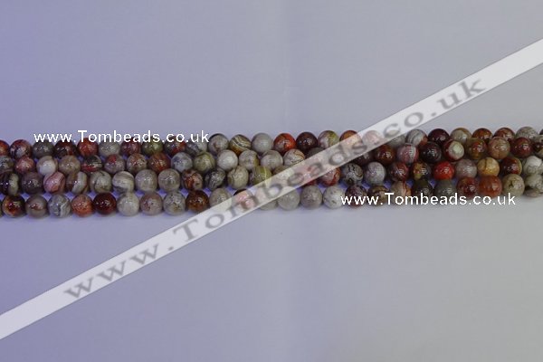 CAG9110 15.5 inches 4mm round Mexican crazy lace agate beads