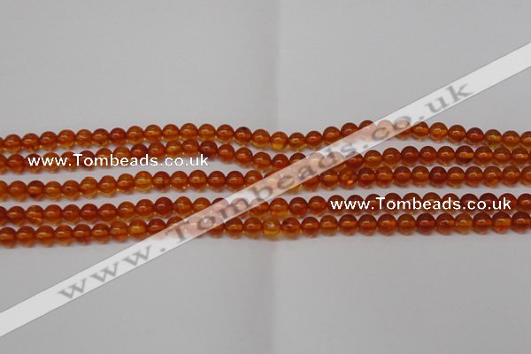 CAR111 15.5 inches 4mm round natural amber beads