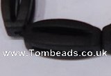 CBS28 15.5 inches 15*35mm carved flat drum black stone beads