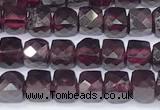 CCU847 15 inches 4mm faceted cube garnet beads