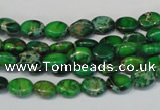 CDE178 15.5 inches 6*8mm oval dyed sea sediment jasper beads