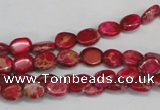 CDI641 15.5 inches 6*8mm oval dyed imperial jasper beads