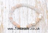 CFB711 faceted rondelle pink aventurine & potato white freshwater pearl stretchy bracelet