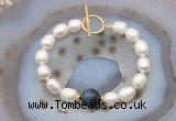 CFB979 Hand-knotted 9mm - 10mm rice white freshwater pearl & blue tiger eye bracelet