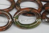 CFG271 15.5 inches 24*30mm carved oval unakite gemstone beads