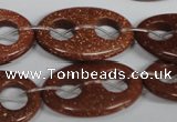 CFG307 15.5 inches 20*30mm carved oval goldstone beads