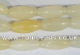 CFG552 15.5 inches 8*20mm carved rice yellow aventurine beads