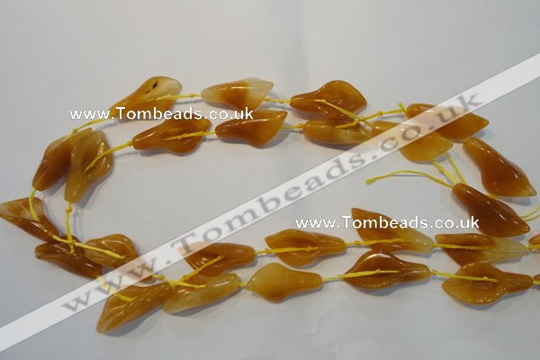 CFG560 15.5 inches 14*28mm carved trumpet flower yellow jade beads