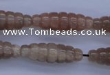 CFG755 15.5 inches 10*30mm carved rice natural moonstone beads