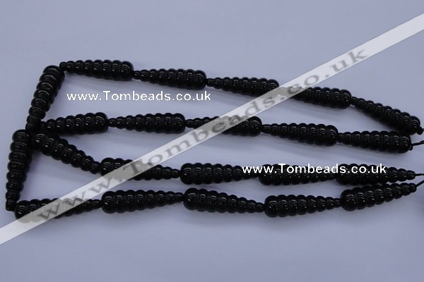 CFG761 15.5 inches 10*35mm carved teardrop black agate beads