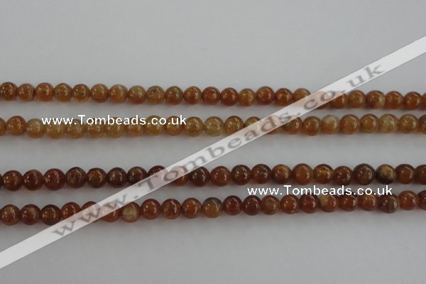 CGA501 15.5 inches 4mm round A grade yellow red garnet beads